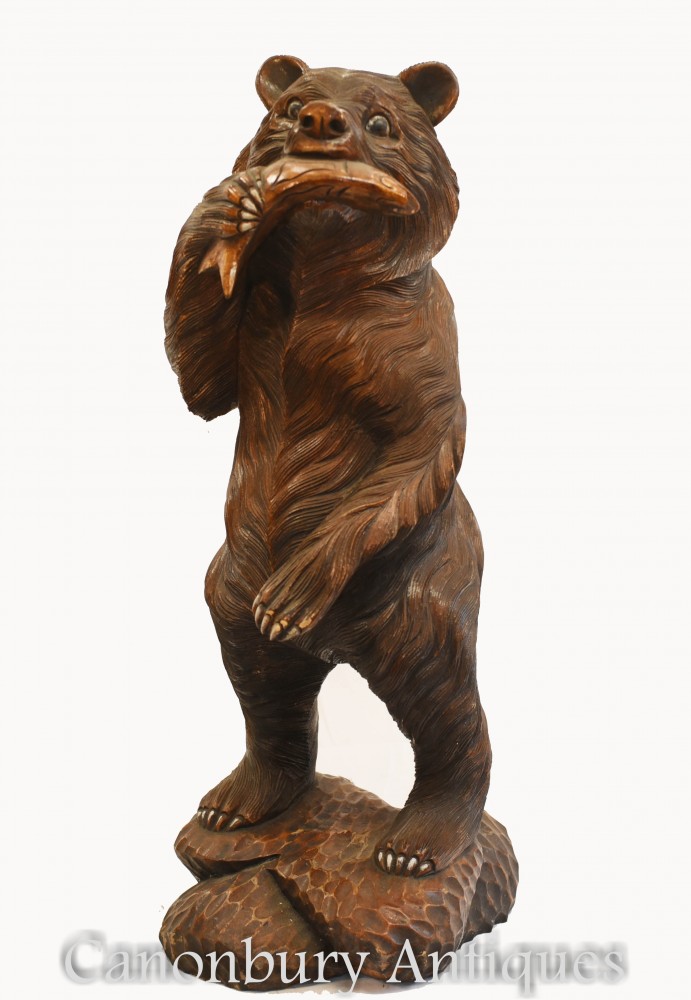 黑森林熊和鲑鱼雕刻雕像布朗美国狩猎小屋